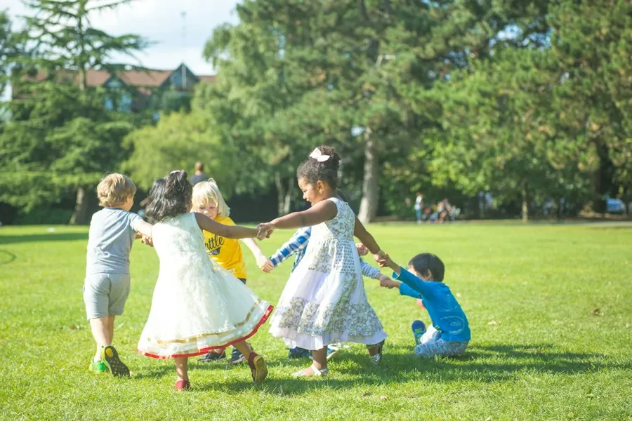 Children holding hands in a circle